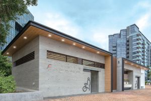 The Pak Shek Kok public toilet is the first themed smart public toilet of its kind in Hong Kong.  The design and fittings of the public toilet are based on a cycling theme, meaning that the public toilet can blend in harmoniously with the neighbouring cycling track.