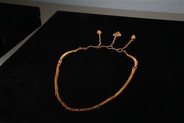 The opening ceremony of the exhibition entitled "Launch from Greater Bay Area: Nanhai I Shipwreck and the Maritime Silk Road" was held today (August 15). Photo shows a necklace with gold chain and rhinoceros horn-shaped cone ornaments discovered from Nanhai I, an ocean-going merchant ship of the Southern Song dynasty.